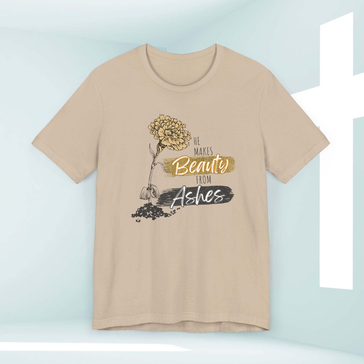 Women's Christian T-shirt with 'He Makes Beauty From Ashes' Bible verse message in beige, inspirational faith-based clothing.