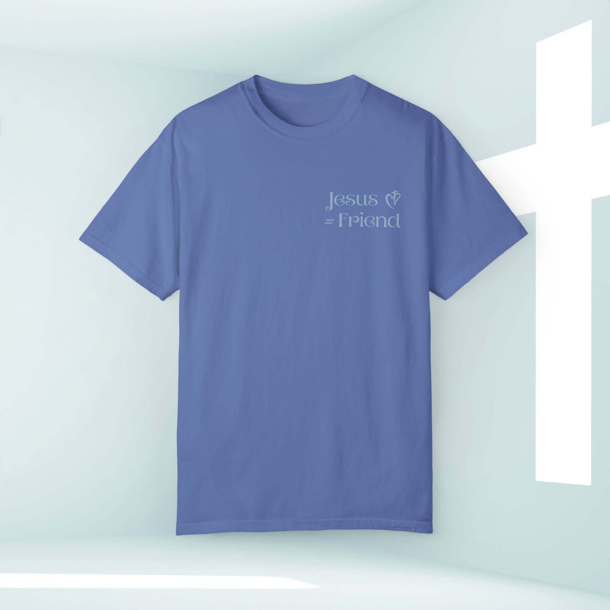 Light blue Christian t-shirt with "Jesus is Friend" text promoting faith and spirituality