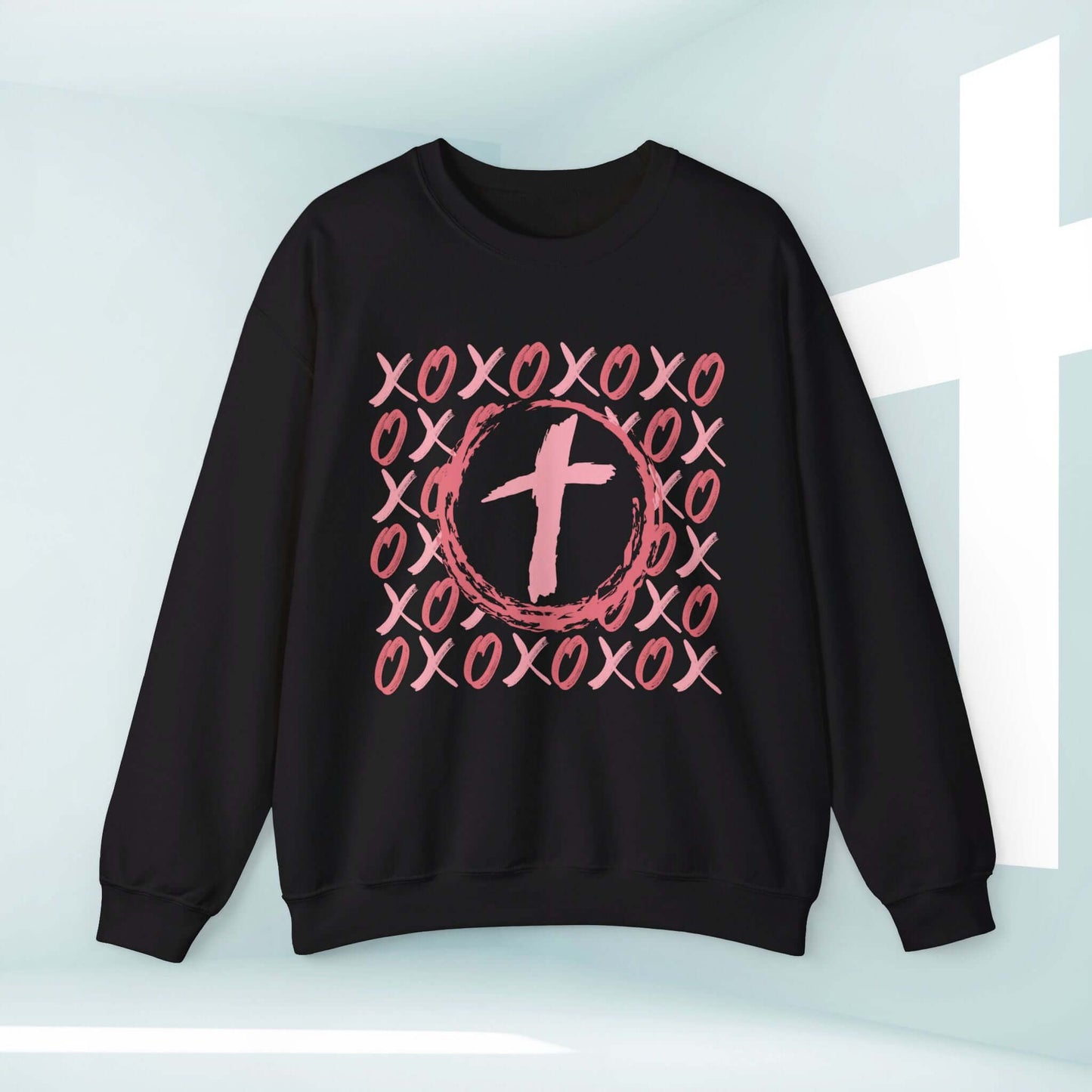 Christian wedding love sweatshirt with pink XOXO heart cross design, perfect Valentine's Day gift, black unisex valentines sweater