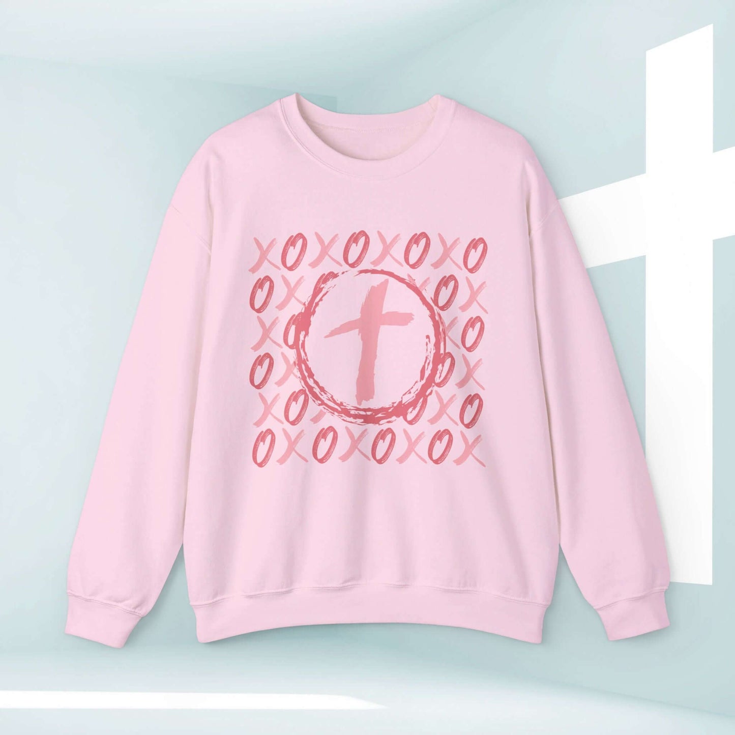 Christian wedding love sweatshirt with XOXO heart and cross design, perfect Valentine's Day gift, pink unisex faith-based anniversary sweater.