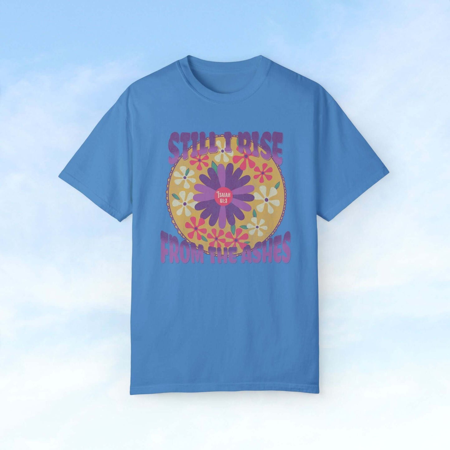 "Still I Rise From The Ashes Christian floral t-shirt on blue background, faith-inspired bible verse shirt"