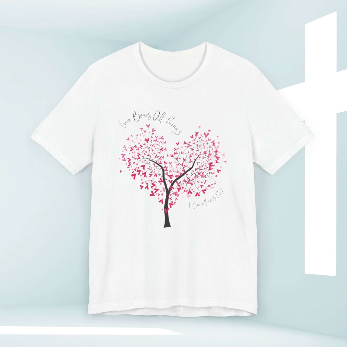 Christian love t-shirt with heart tree design, perfect for weddings, Valentine's Day and faith-based occasions. Love Bears All Things text.