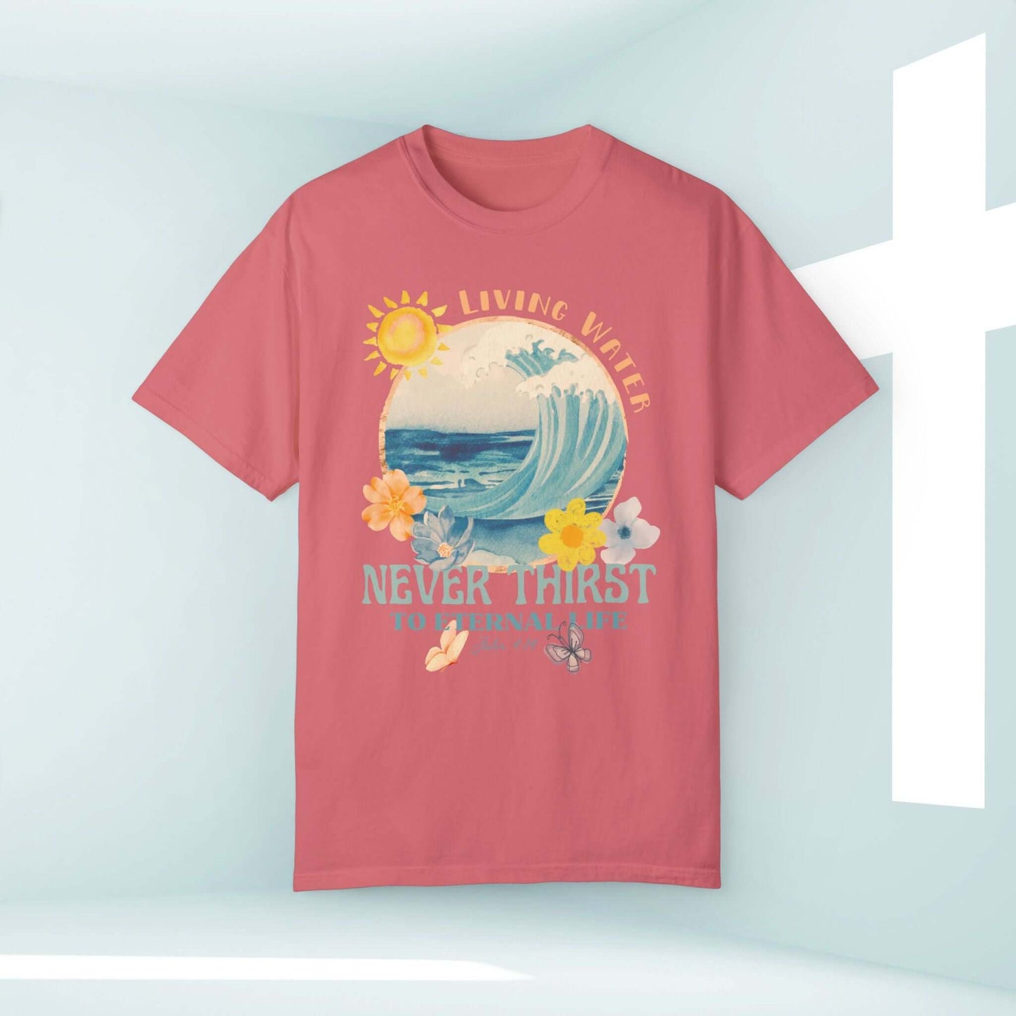 Living Water t-shirt with Bible verse, Christian beach shirt in coral, featuring waves, sun, and floral design for faith inspiration