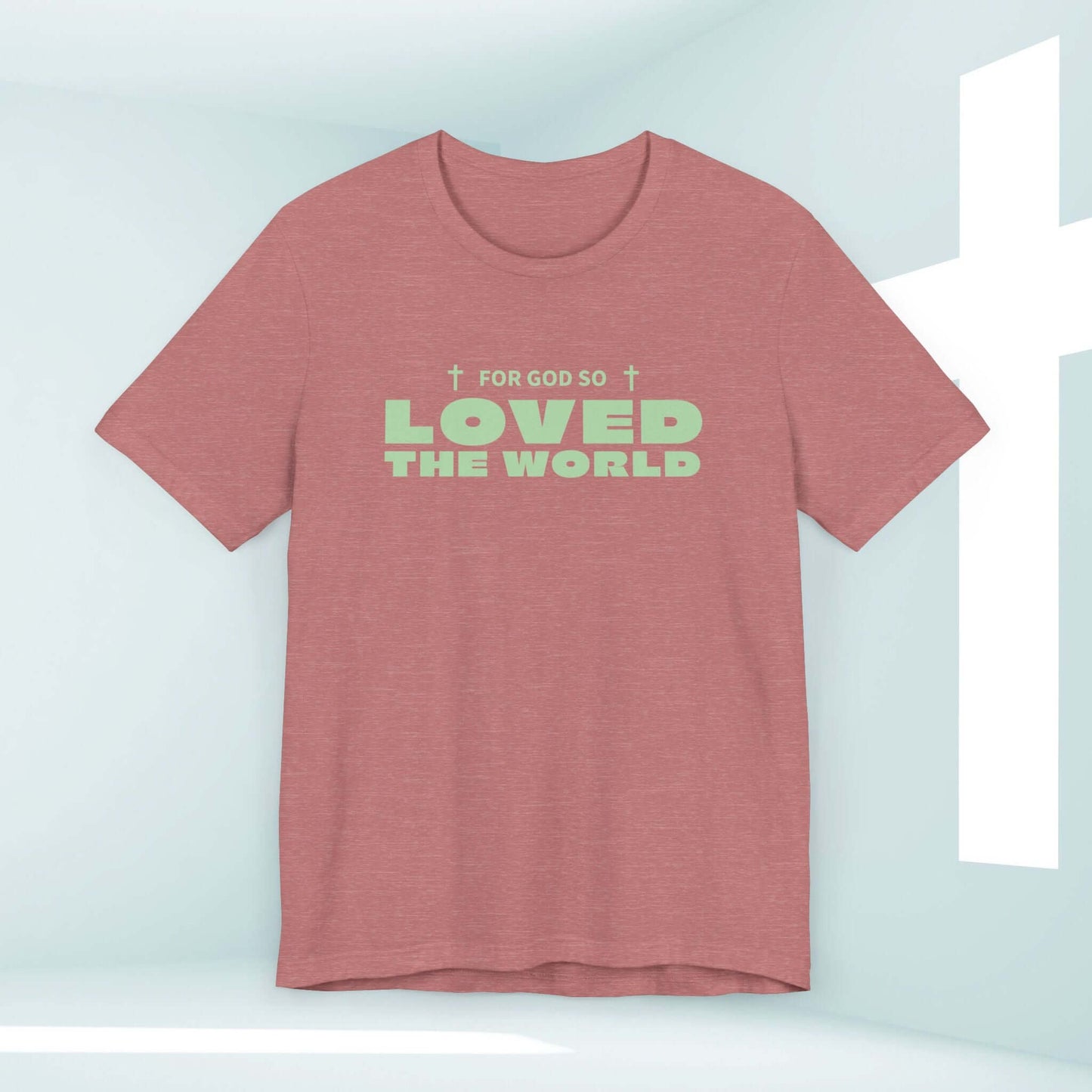 John 3:16 Christian t-shirt with "For God So Loved the World" text in mint green.