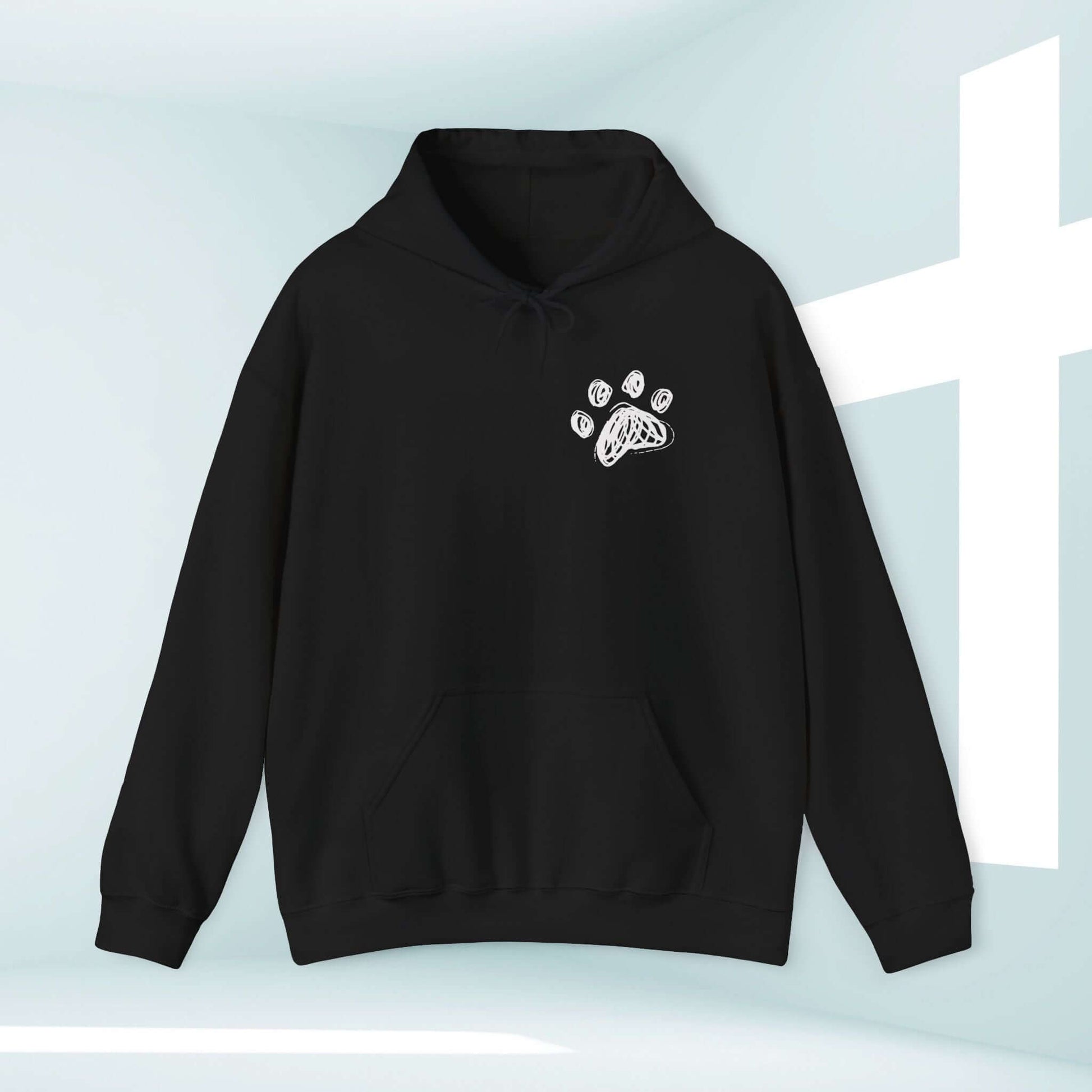 Black Dog Mom Christian hoodie with paw print design, perfect for dog lovers, featuring faith-based graphic and religious inspiration.