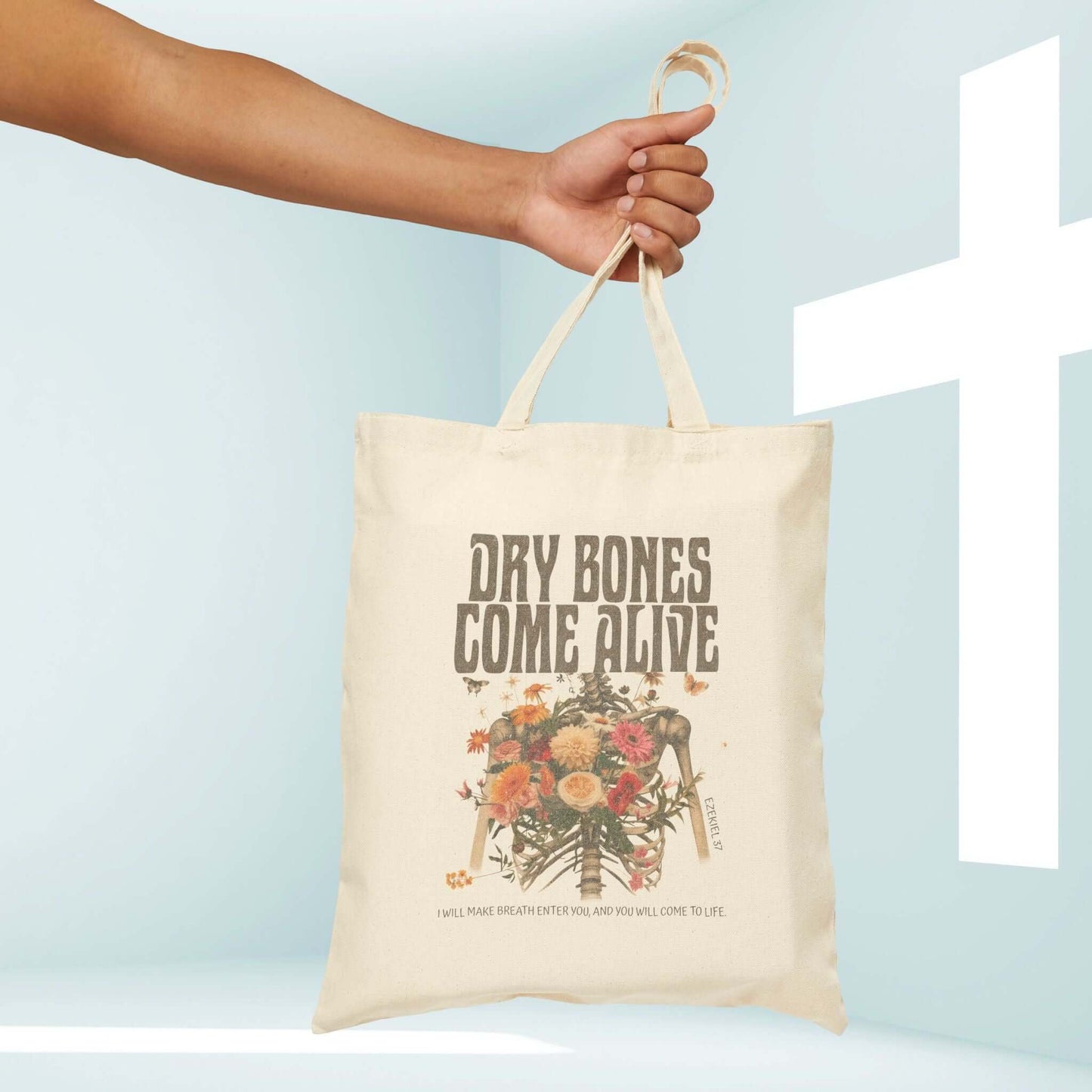 Christian Halloween tote bag with "Dry Bones Come Alive" design, featuring a cute skeleton and flowers, perfect for trick or treat.