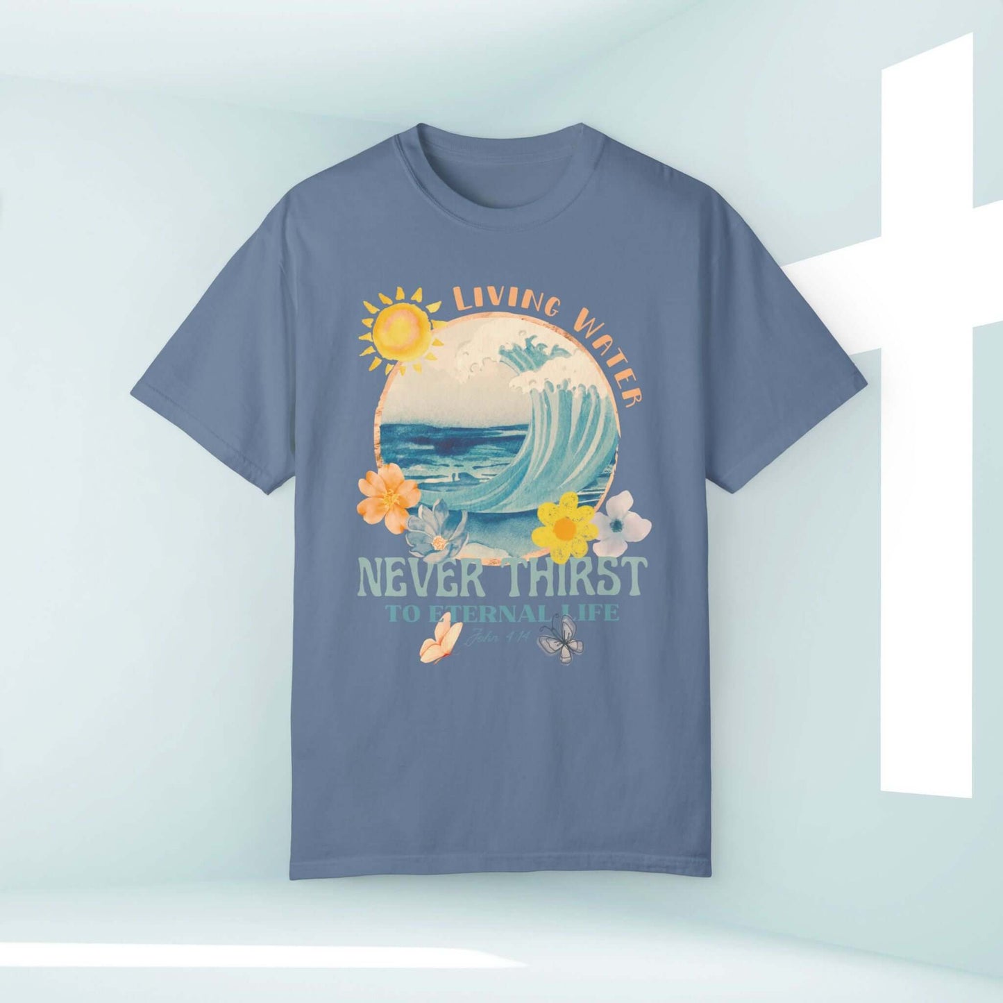 Living Water beach t-shirt featuring Bible verse with ocean wave, flowers, and sun design; Christian faith-based apparel for summer.