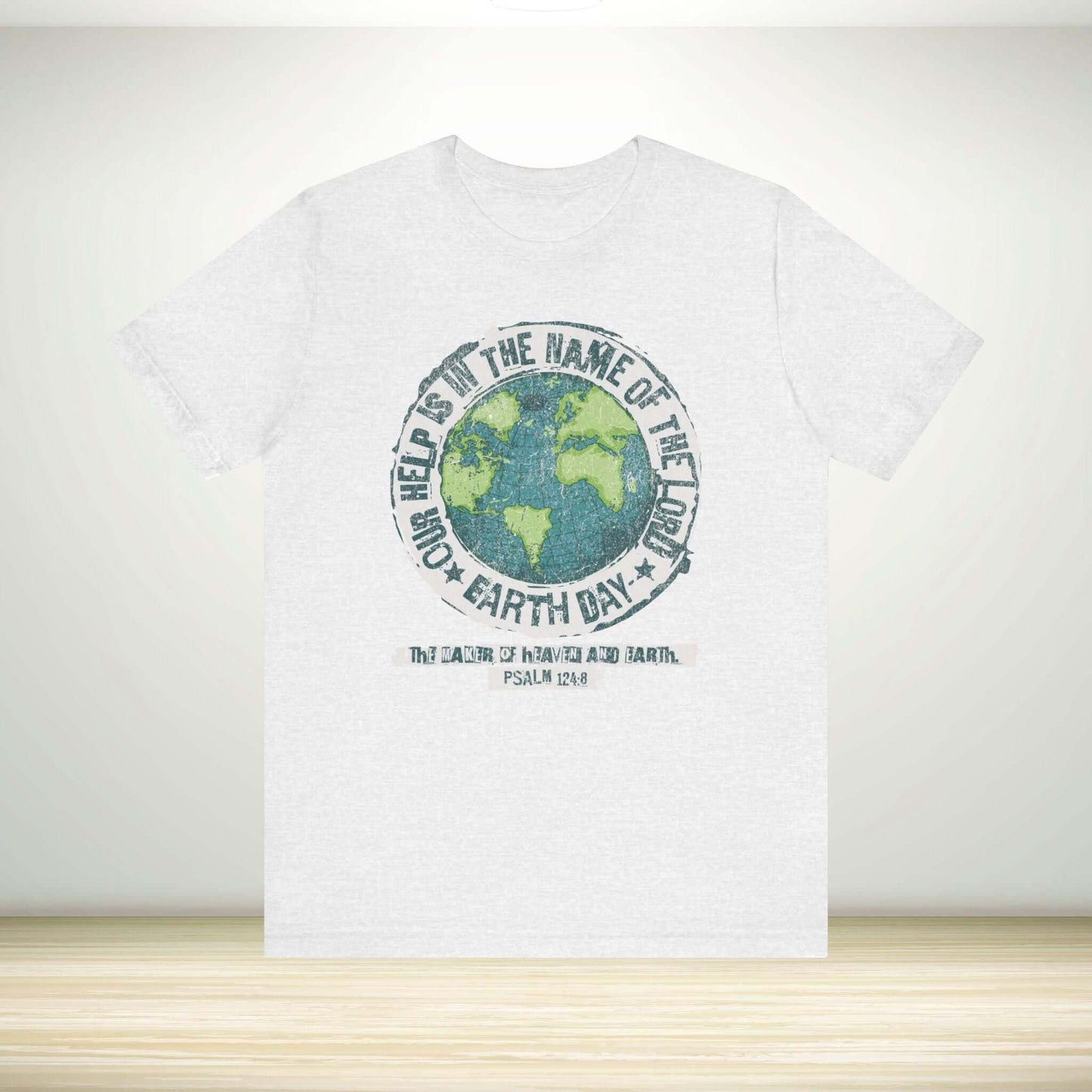 Christian Earth Day shirt with globe graphic and Bible verse, promoting faith-based apparel for Earth Day celebration.