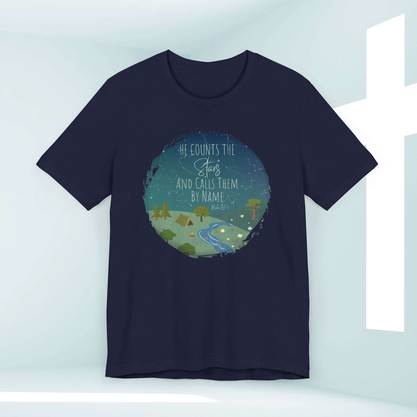 Inspirational "He Counts The Stars And Calls Them By Name" Christian t-shirt for women, featuring a serene nature camping scene. Faith-based apparel.