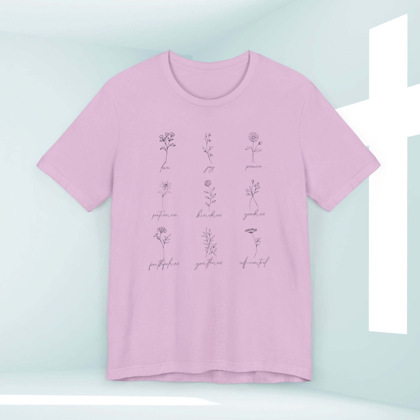 Fruits of the Spirit women's Christian tee shirt with Bible verse design in pastel pink, inspirational faith-based graphic T-shirt.