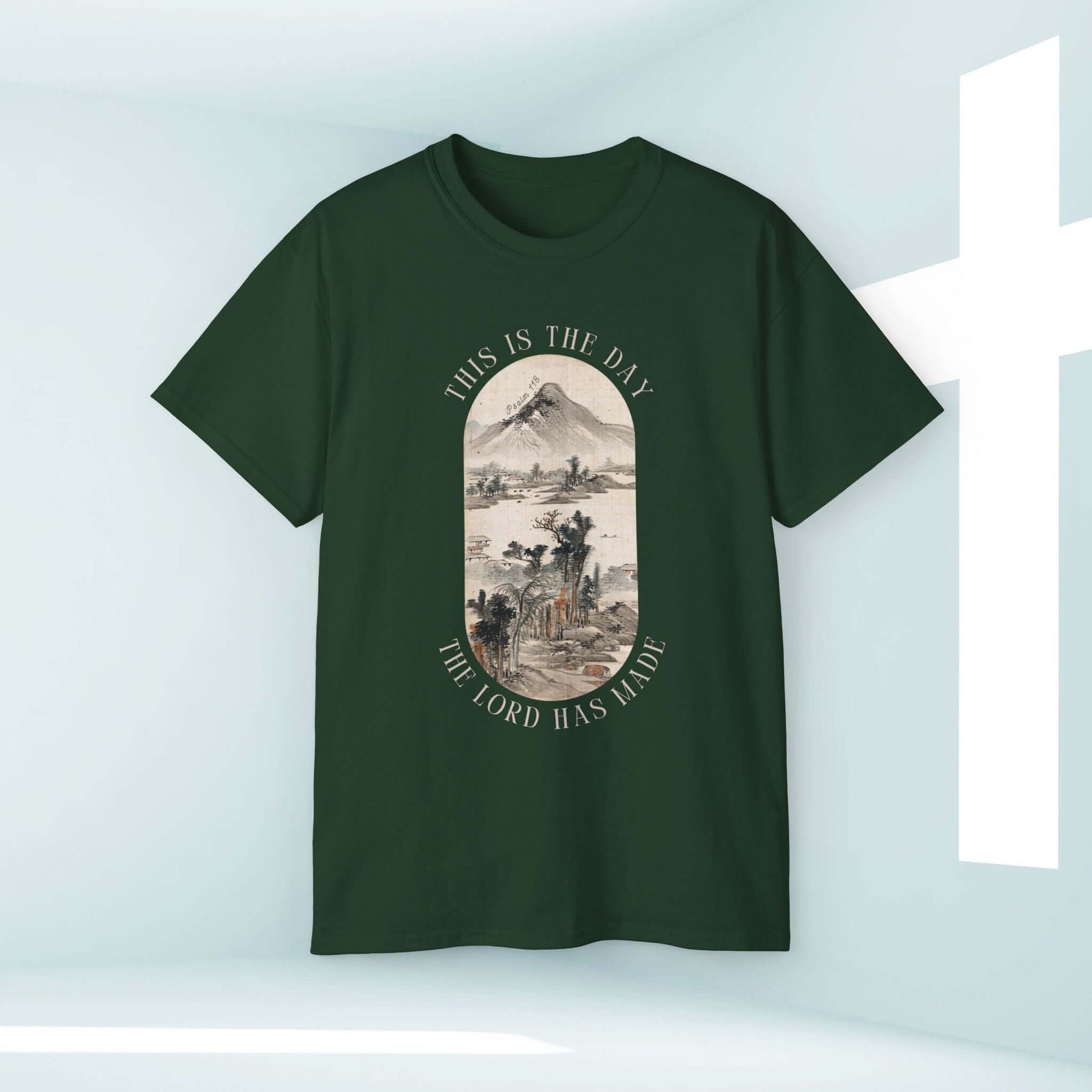 This Is The Day The Lord Has Made men's Christian t-shirt with mountain nature design on green background