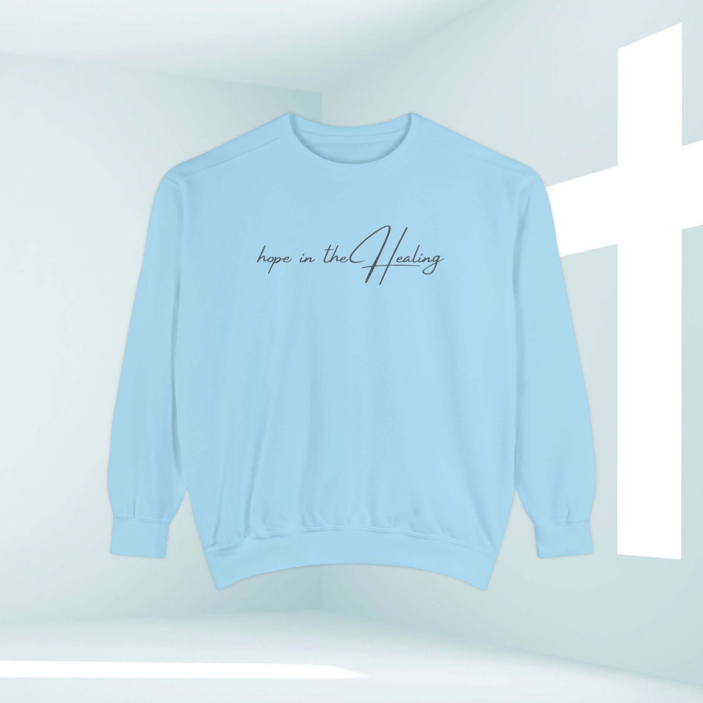 Light blue "Hope In The Healing" Christian sweatshirt with faith-based message, ideal as a get well soon gift, and cancer survivor support.