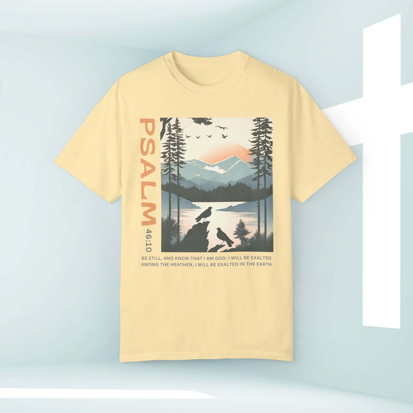 Peace Be Still Birds Christian T-shirt with Psalm 46:10, featuring scenic mountains and birds, faith-based inspirational shirt