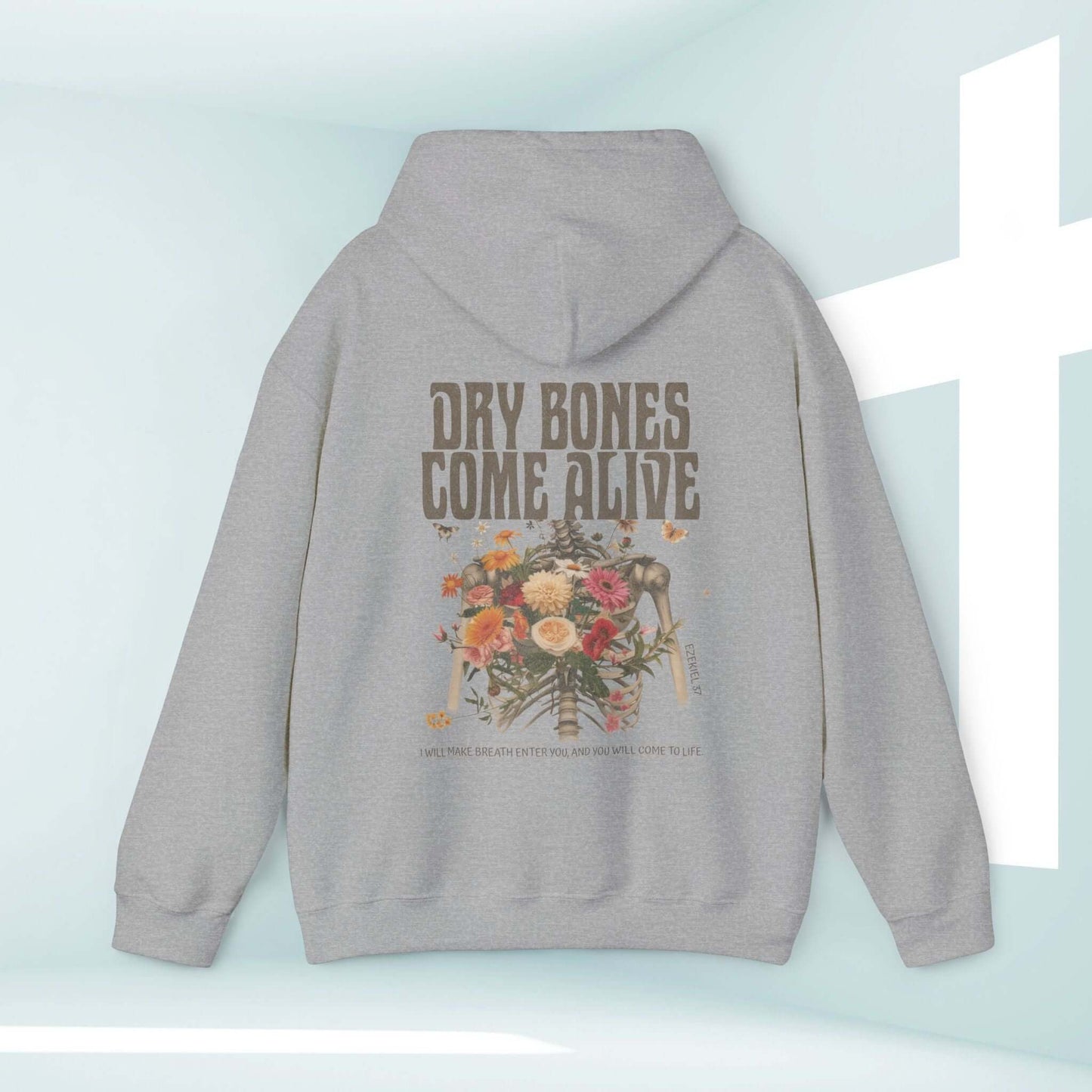 Christian Halloween hoodie with "Dry Bones Come Alive" design, featuring a floral skeleton on a soft gray sweatshirt.