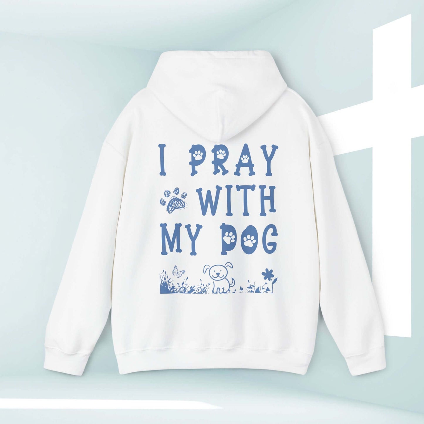 White Christian hoodie with "I Pray With My Dog" text and cute dog graphic, perfect for dog lovers, dog moms, and animal lovers.