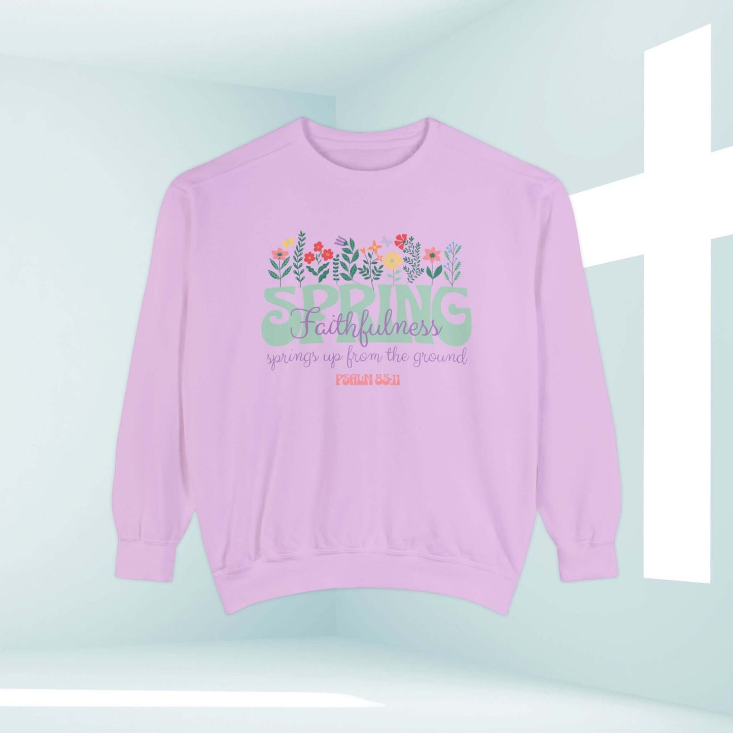 Pink Christian sweatshirt with floral design and "Spring Faithfulness" Bible verse, perfect for inspirational and faith-based wear.