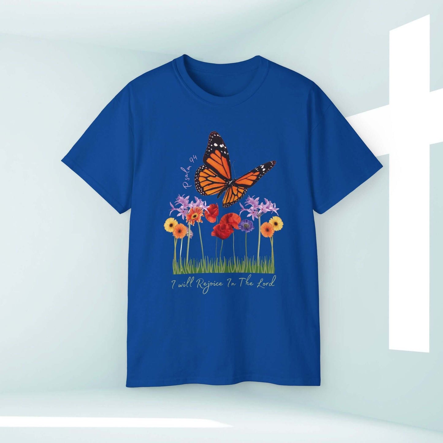 Blue Christian T-shirt with butterfly and floral design, inspired by scripture. Perfect faith-based apparel with bible verse.