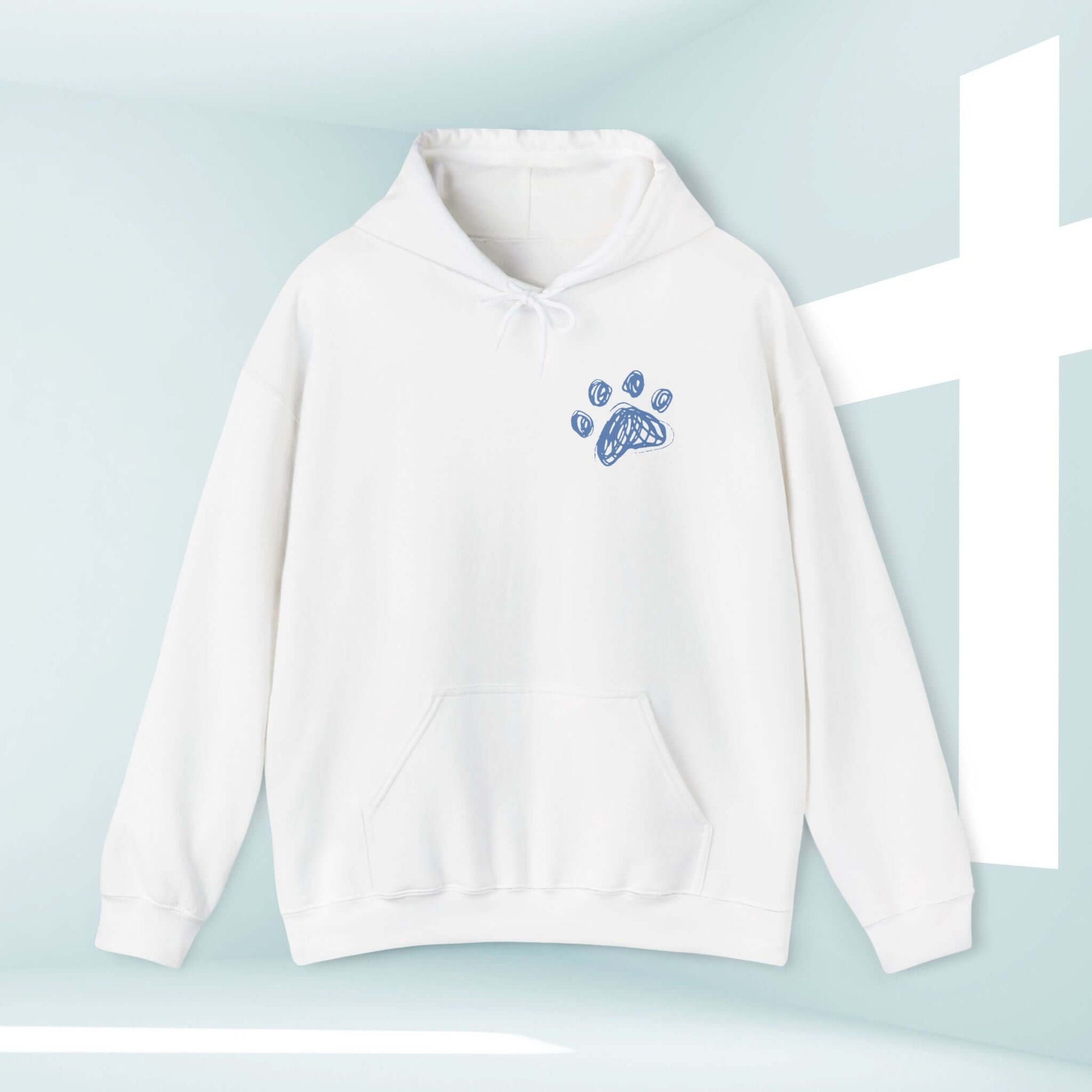 White Christian hoodie with paw print design, symbolizing prayer with dogs and faith in Jesus. Perfect dog mom shirt and animal lover gift.