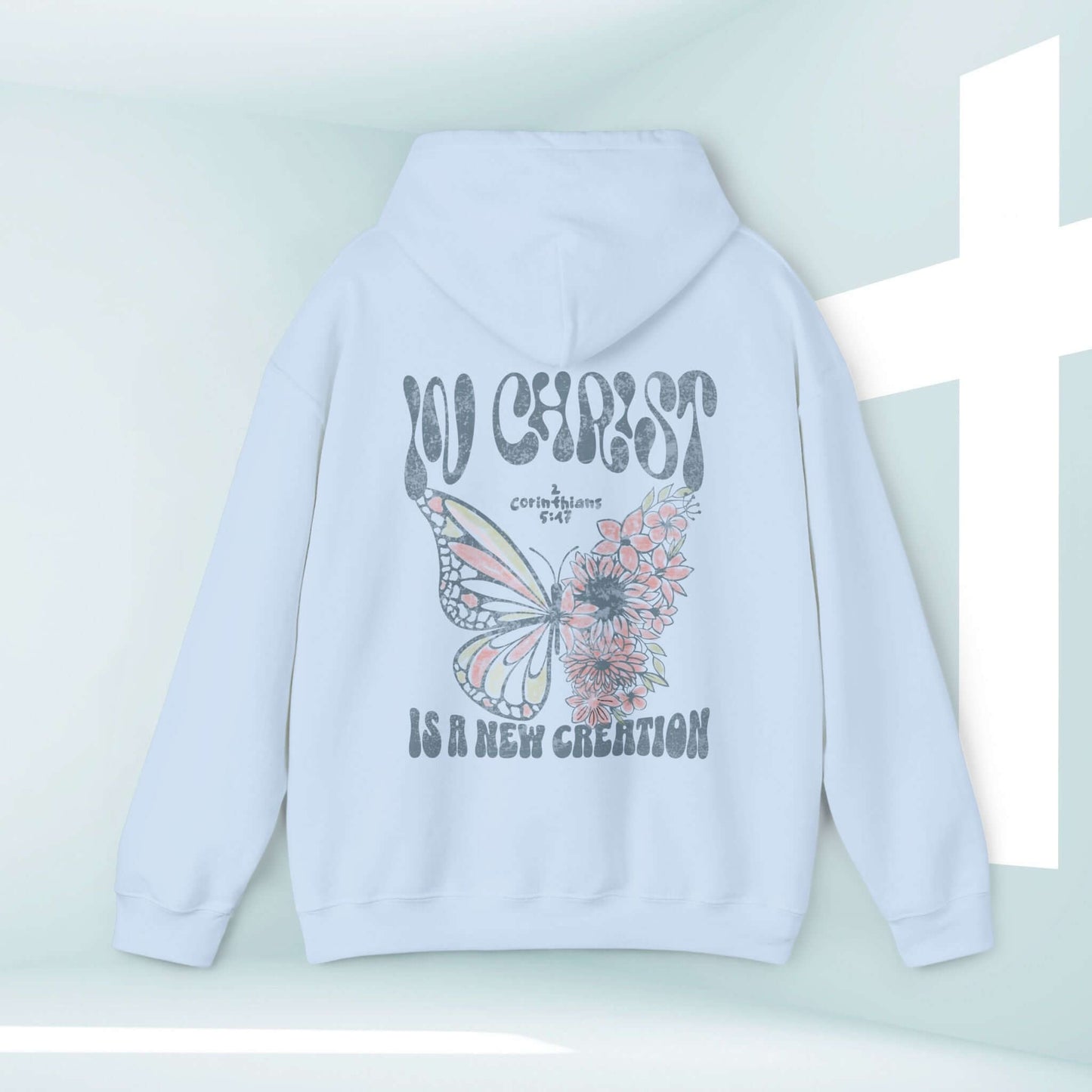 In Christ Is A New Creation Christian Hoodie with butterfly and floral design, faith-based inspirational pullover sweatshirt