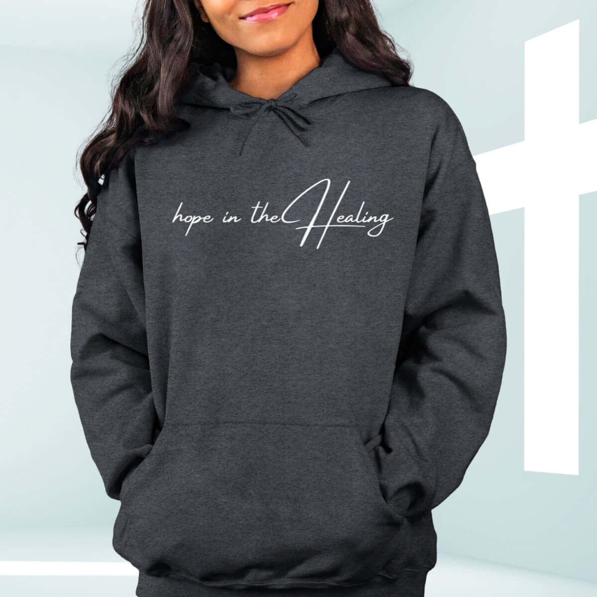 Christian hoodie with "Hope In The Healing" text, faith-based get well soon gift, inspirational bible verse hooded sweatshirt in black.