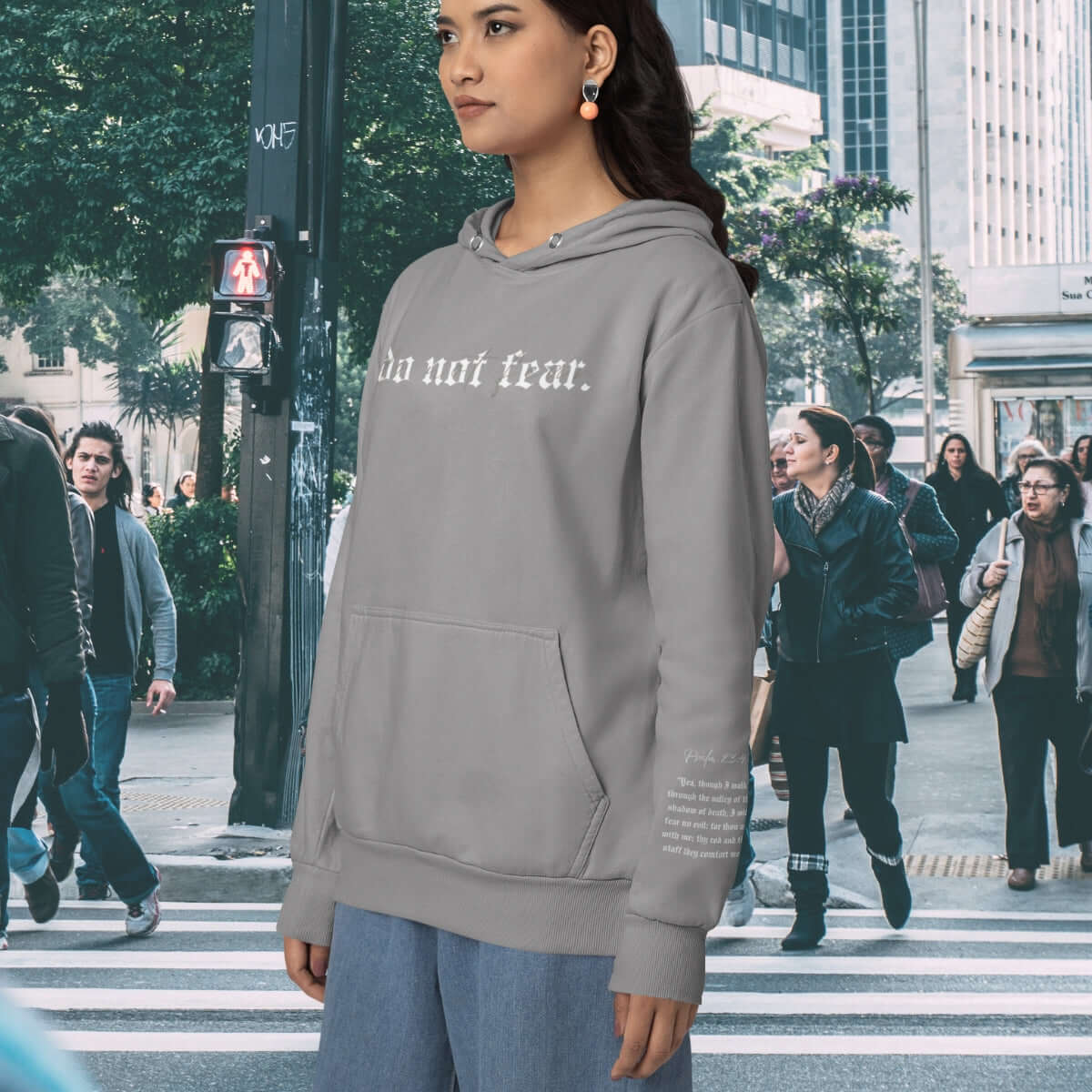 Christian hoodie with "Do Not Fear" text, faith-based Bible verse hooded sweatshirt in gray color with cross background.