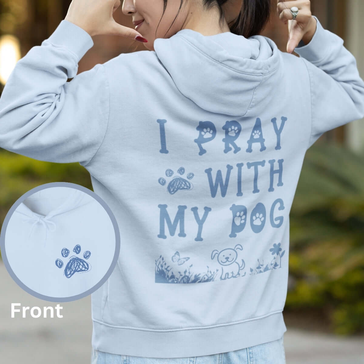 Woman wearing Christian hoodie with "I Pray With My Dog" graphic, showcasing faith and love for dogs. Perfect dog lover sweatshirt gift.