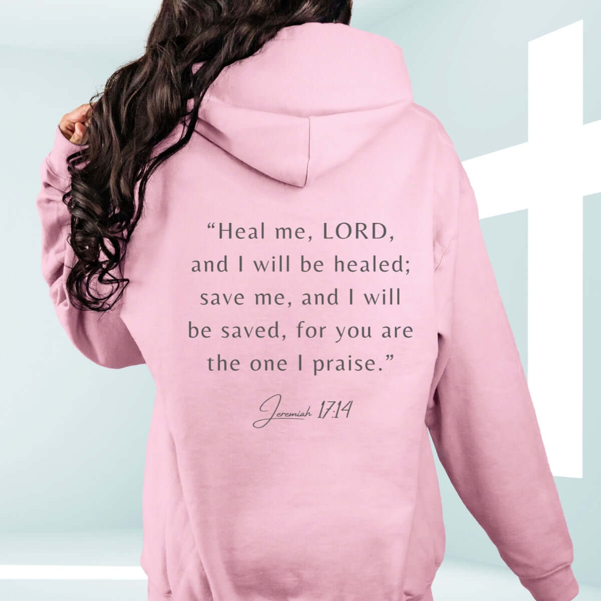 Pink Christian hoodie with Jeremiah 17:14 Bible verse, perfect get well soon and cancer survivor gift, inspirational faith-based apparel.