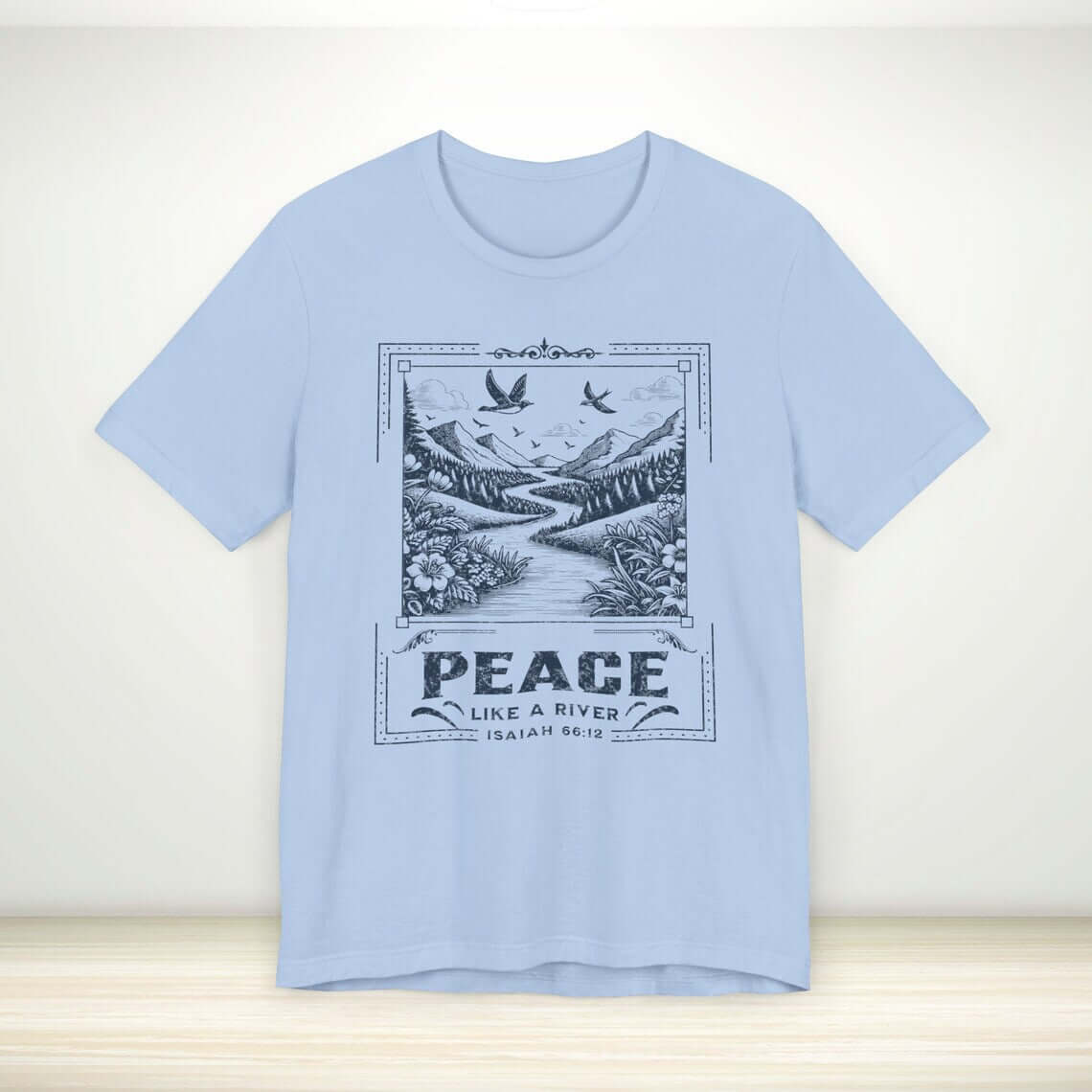 Peace Like A River Christian Tee Bible Verse Shirt in light blue with nature design, perfect Christian apparel for sharing faith and testimony.