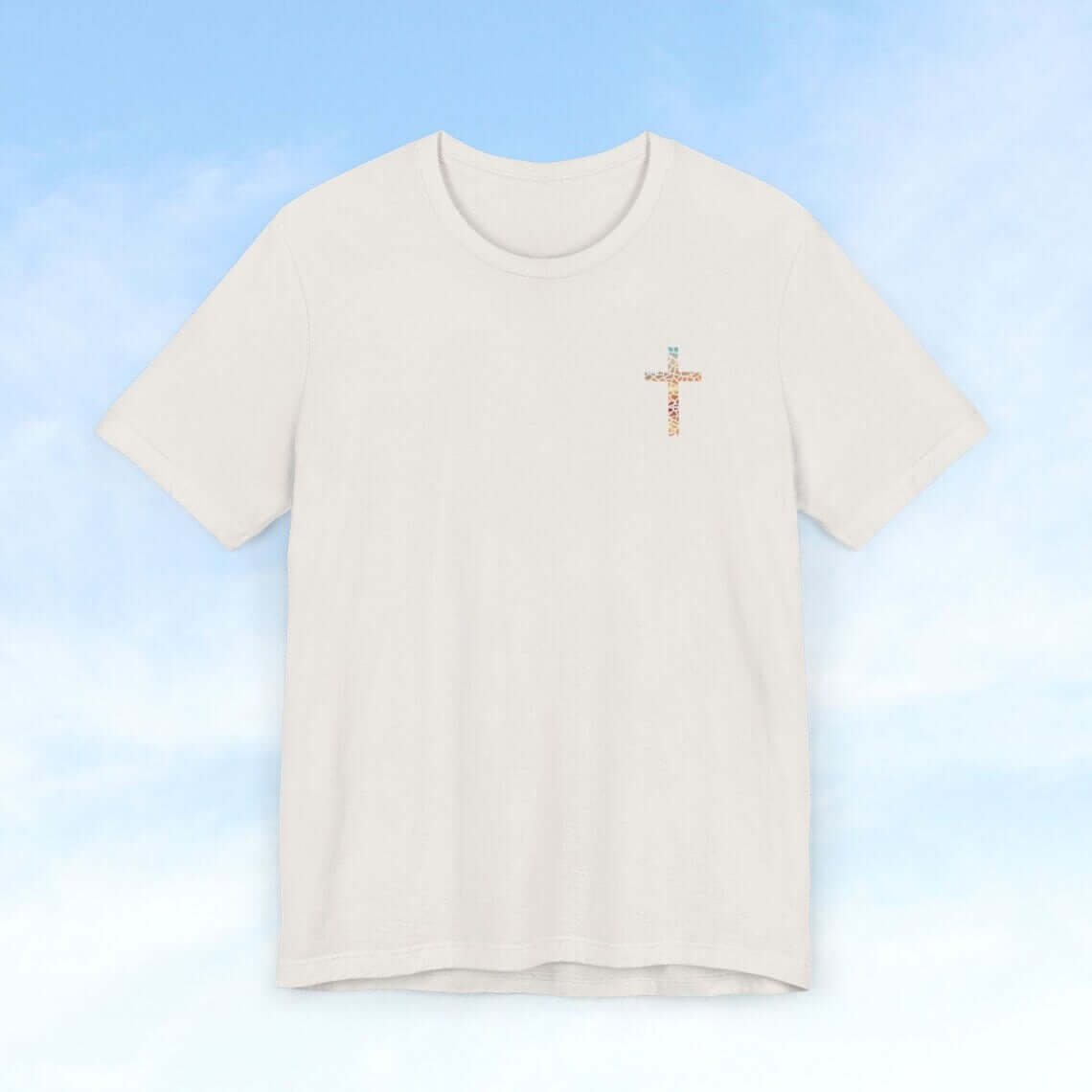 Inspirational "Broken Pieces Into Masterpieces" Christian t-shirt featuring a cross graphic, perfect for showcasing faith and uplifting others.